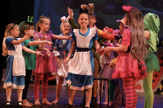Children Performing Alice In Wonderland Musical