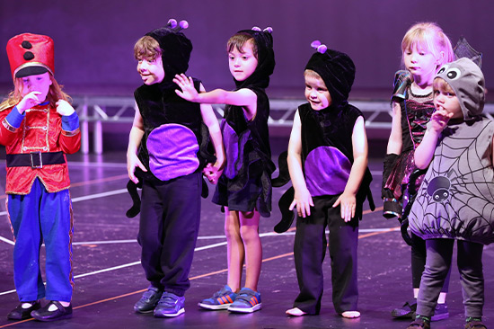 Young Children In Mini Musical Theatre Production